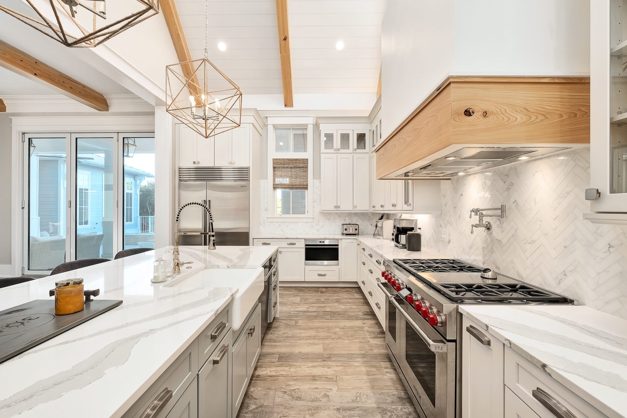 Modern kitchen with white cabinets.