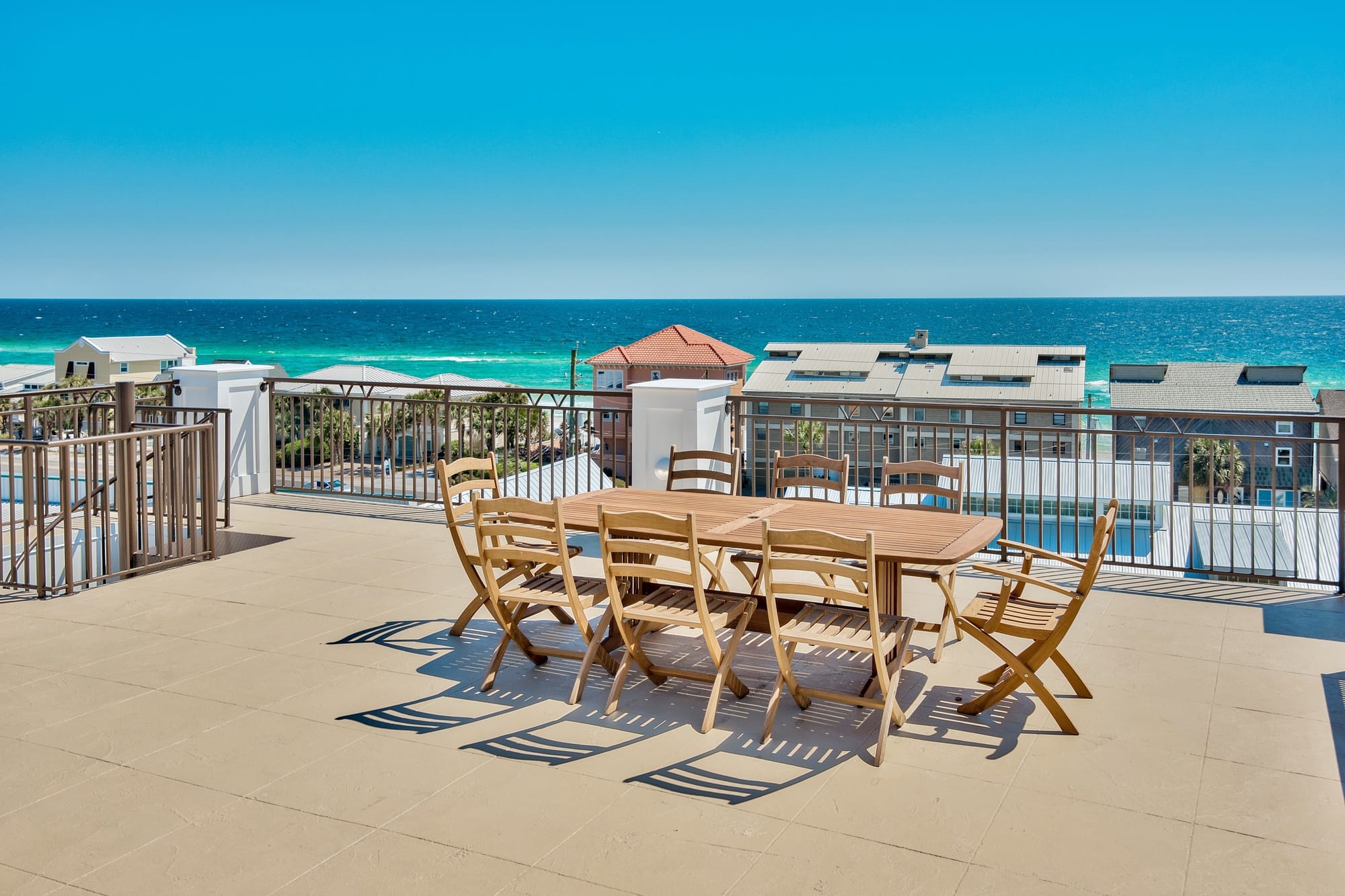 Outdoor patio with ocean view.