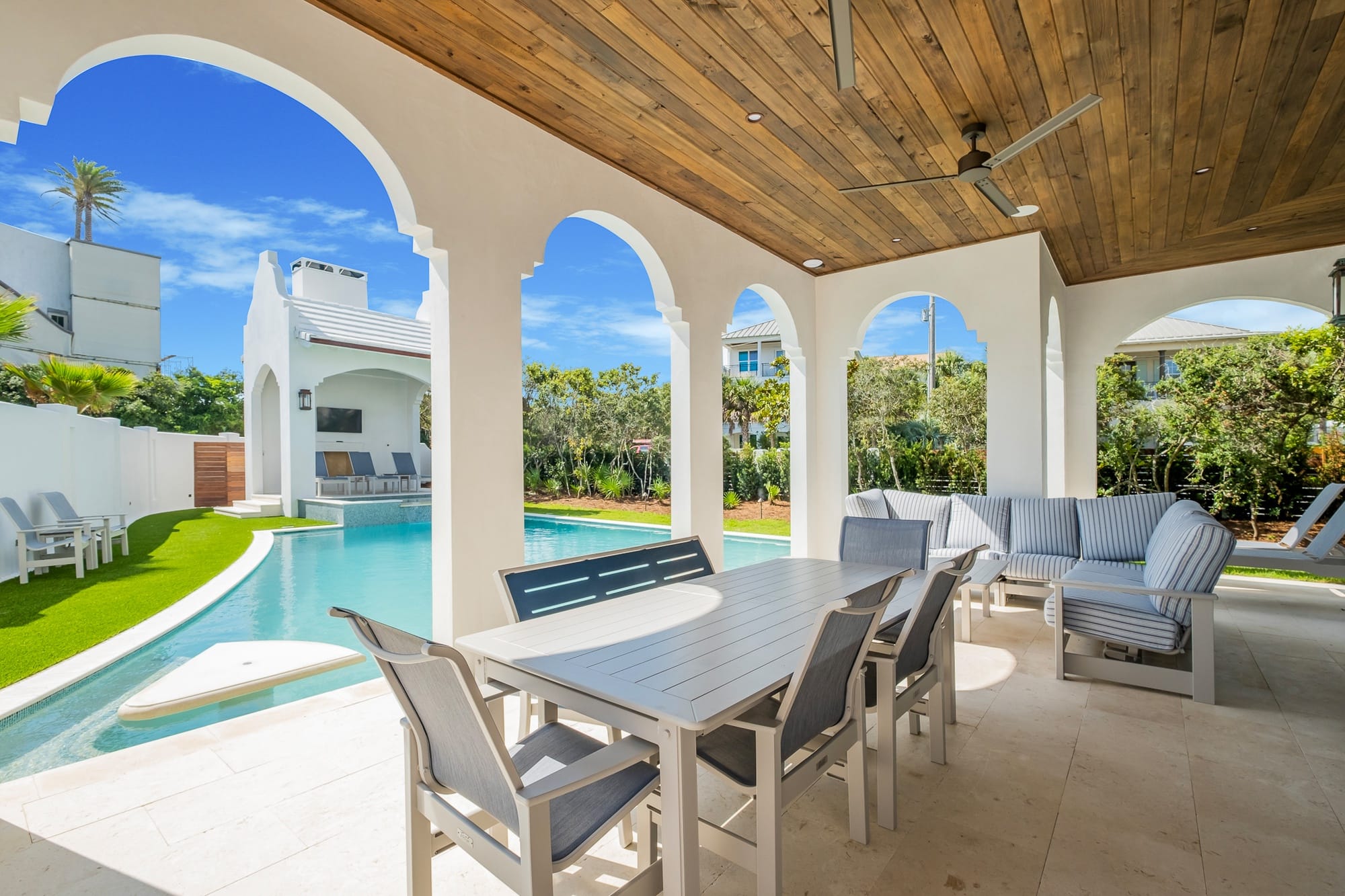 Patio with pool and seating.