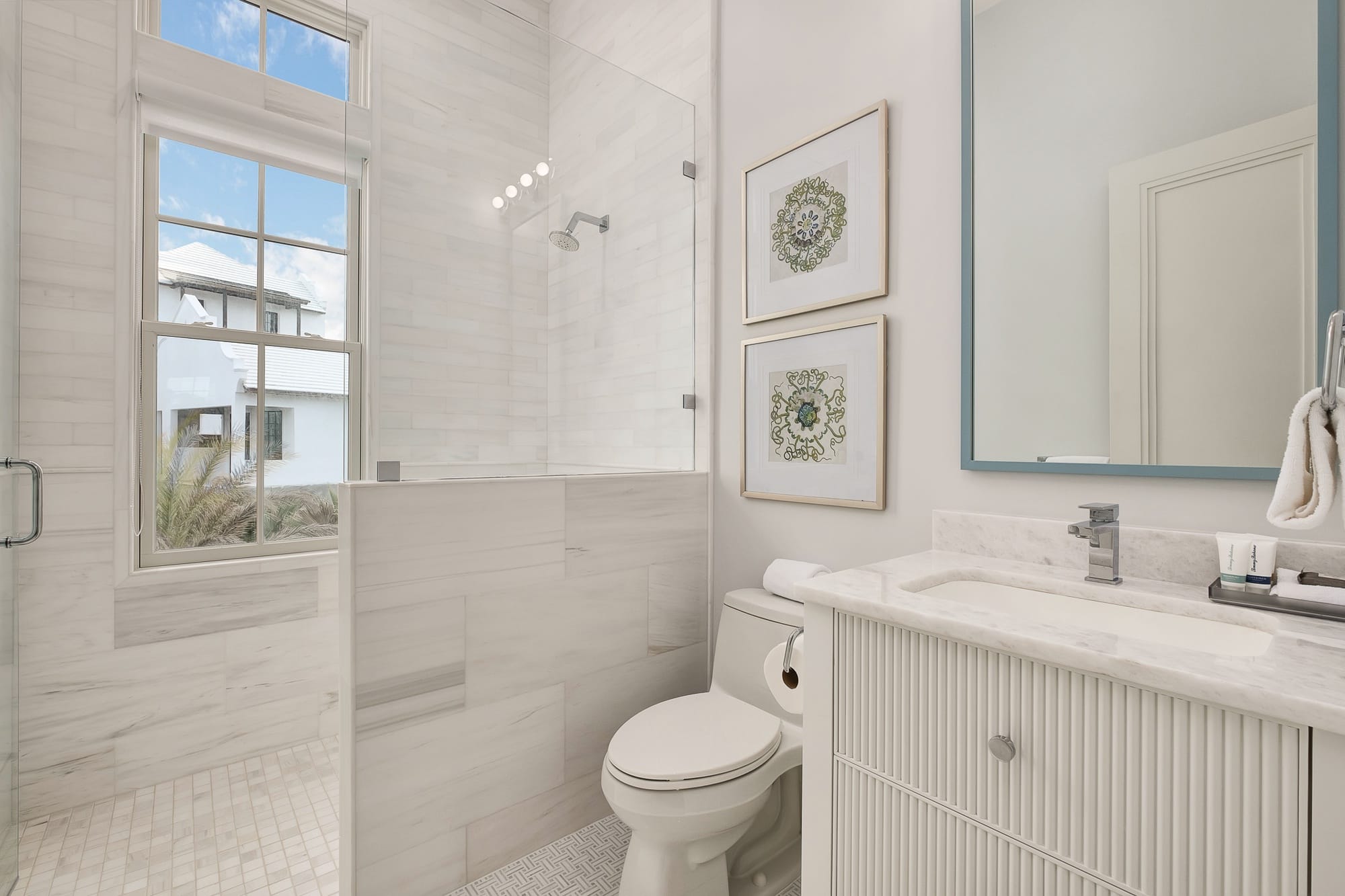 Bright modern bathroom with shower.