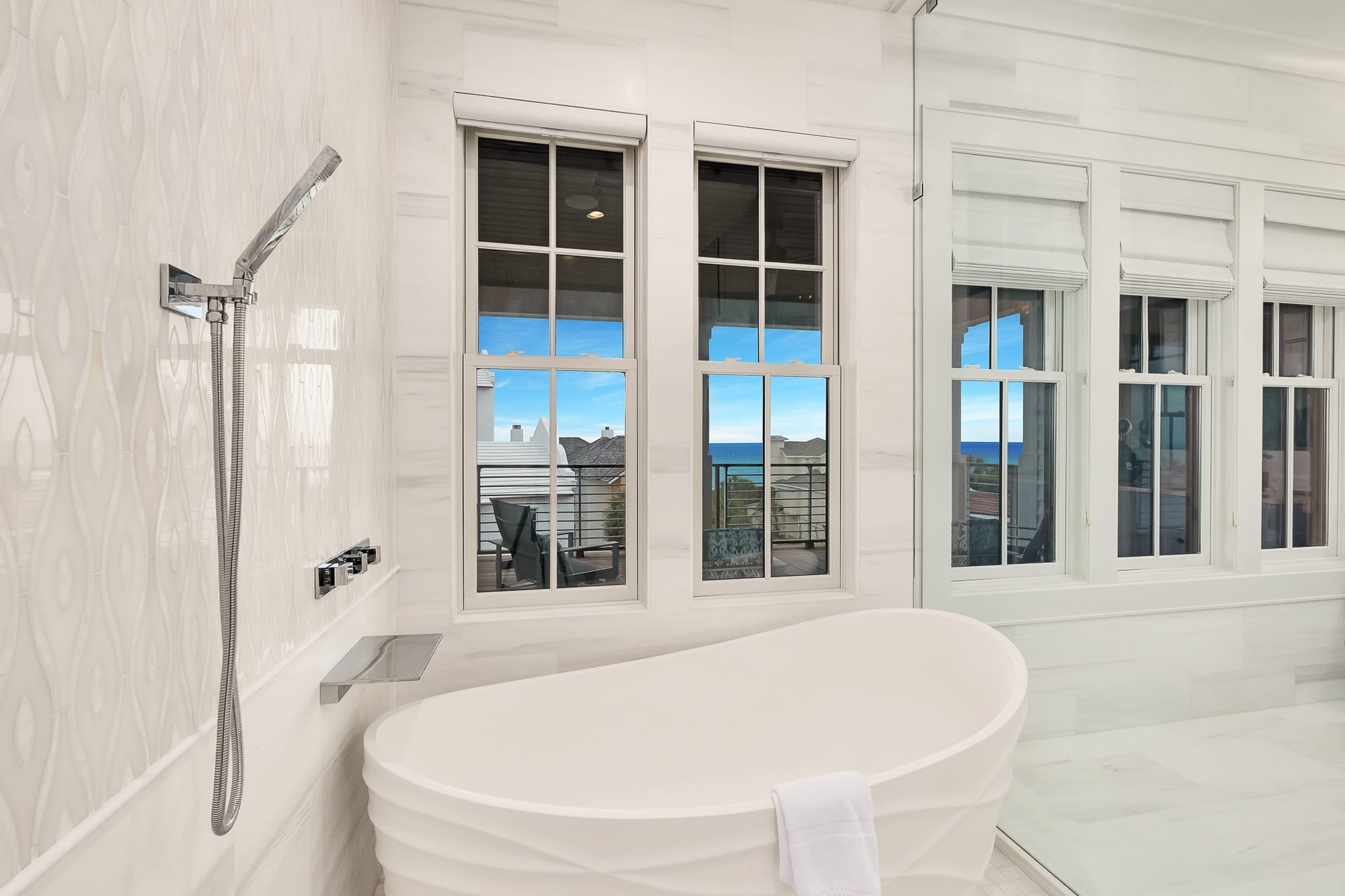 Luxurious bathroom with ocean view.