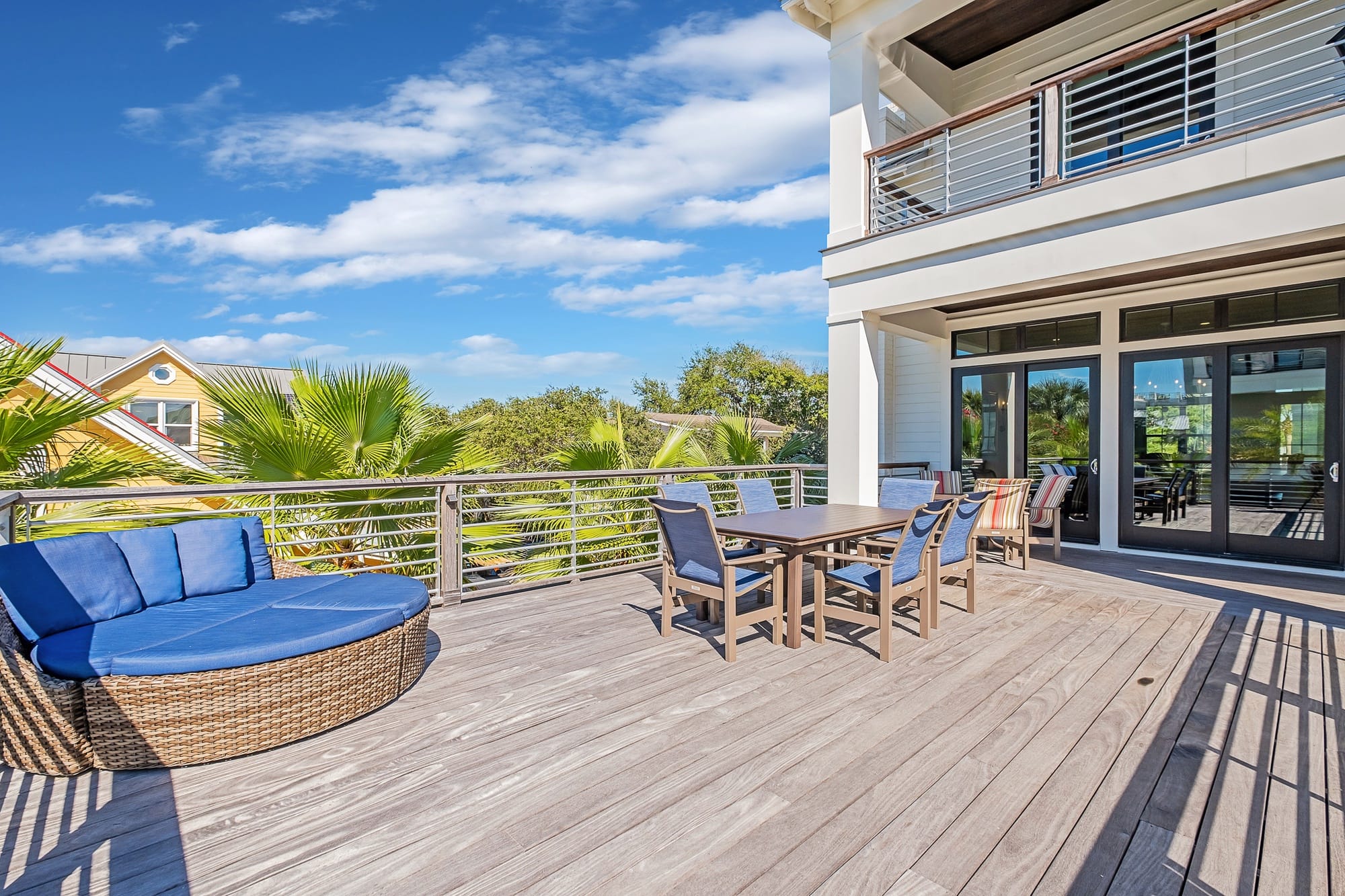 Sunny deck with outdoor furniture.