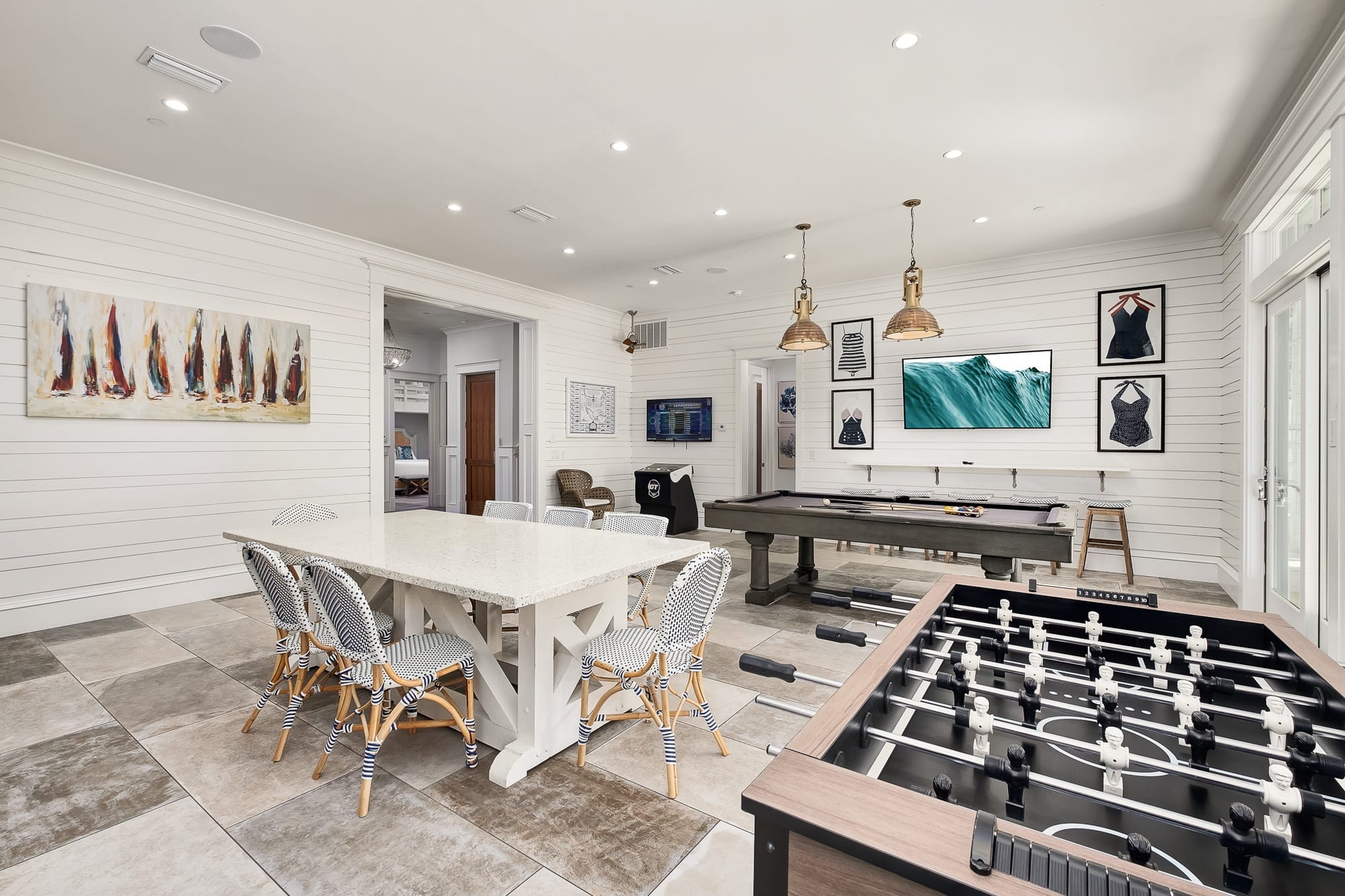 Game room with foosball and pool.