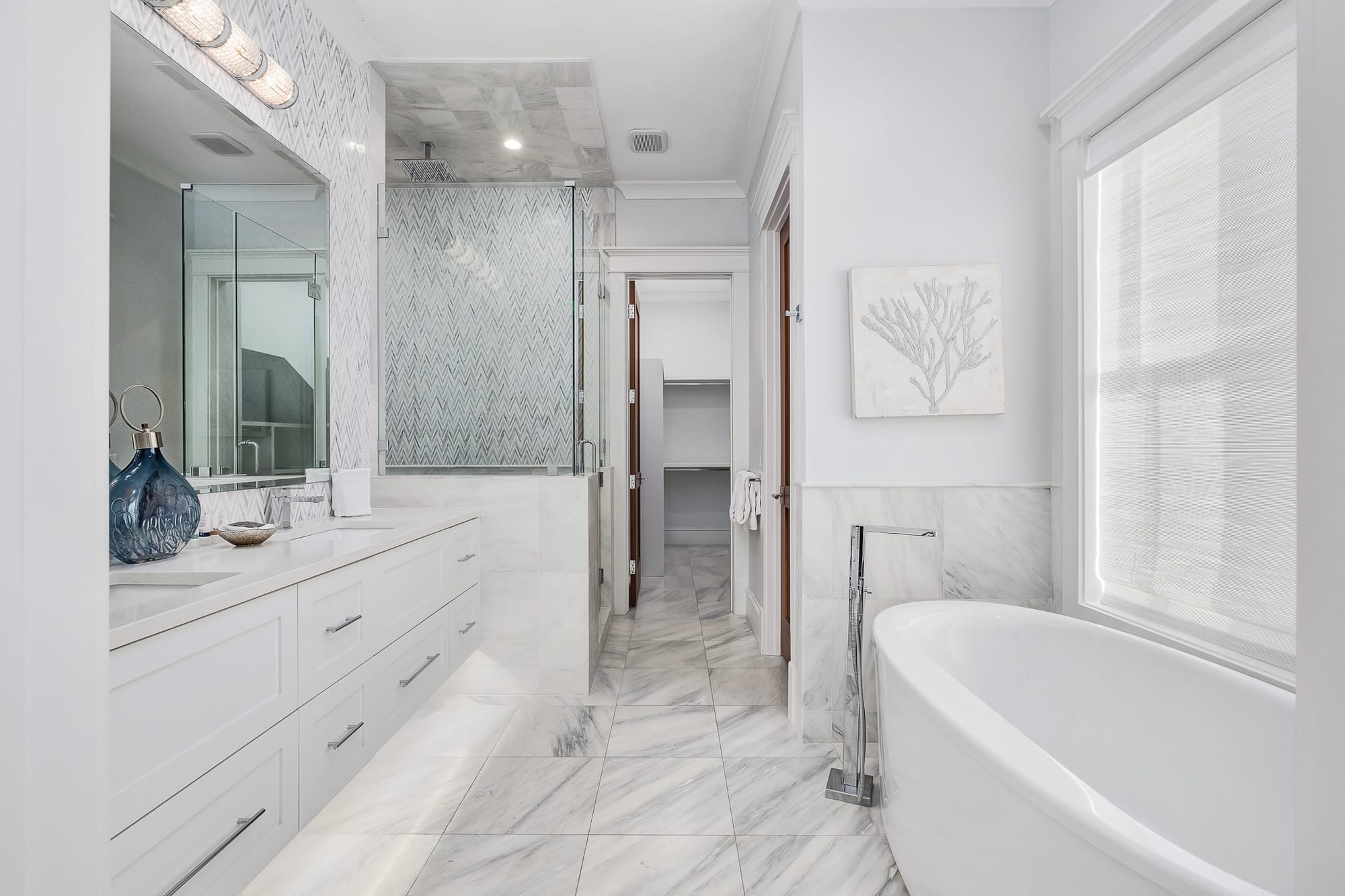 Modern bathroom with tub and shower.