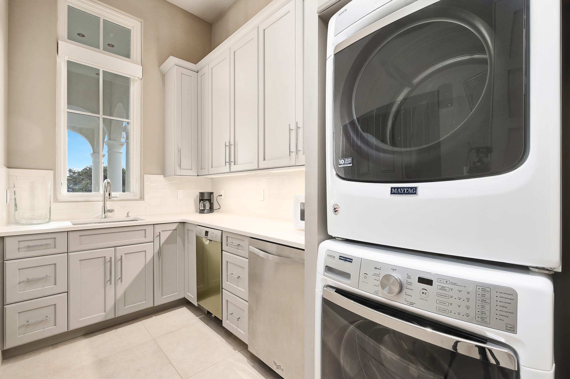 Modern laundry room with appliances.