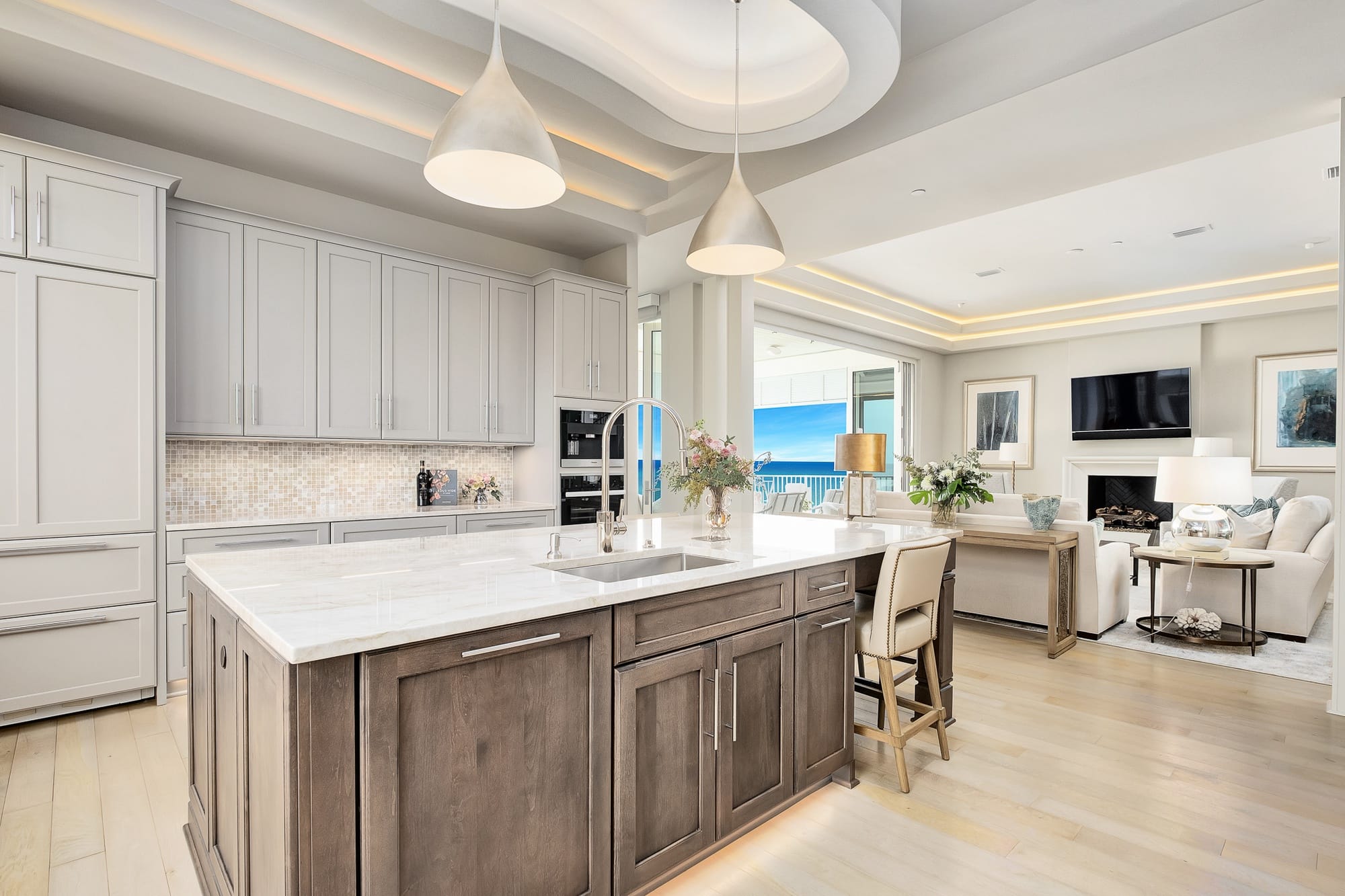 Modern kitchen and living room interior.