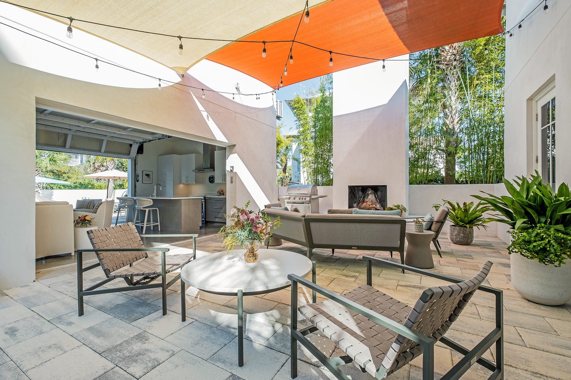 Modern outdoor patio with fireplace.