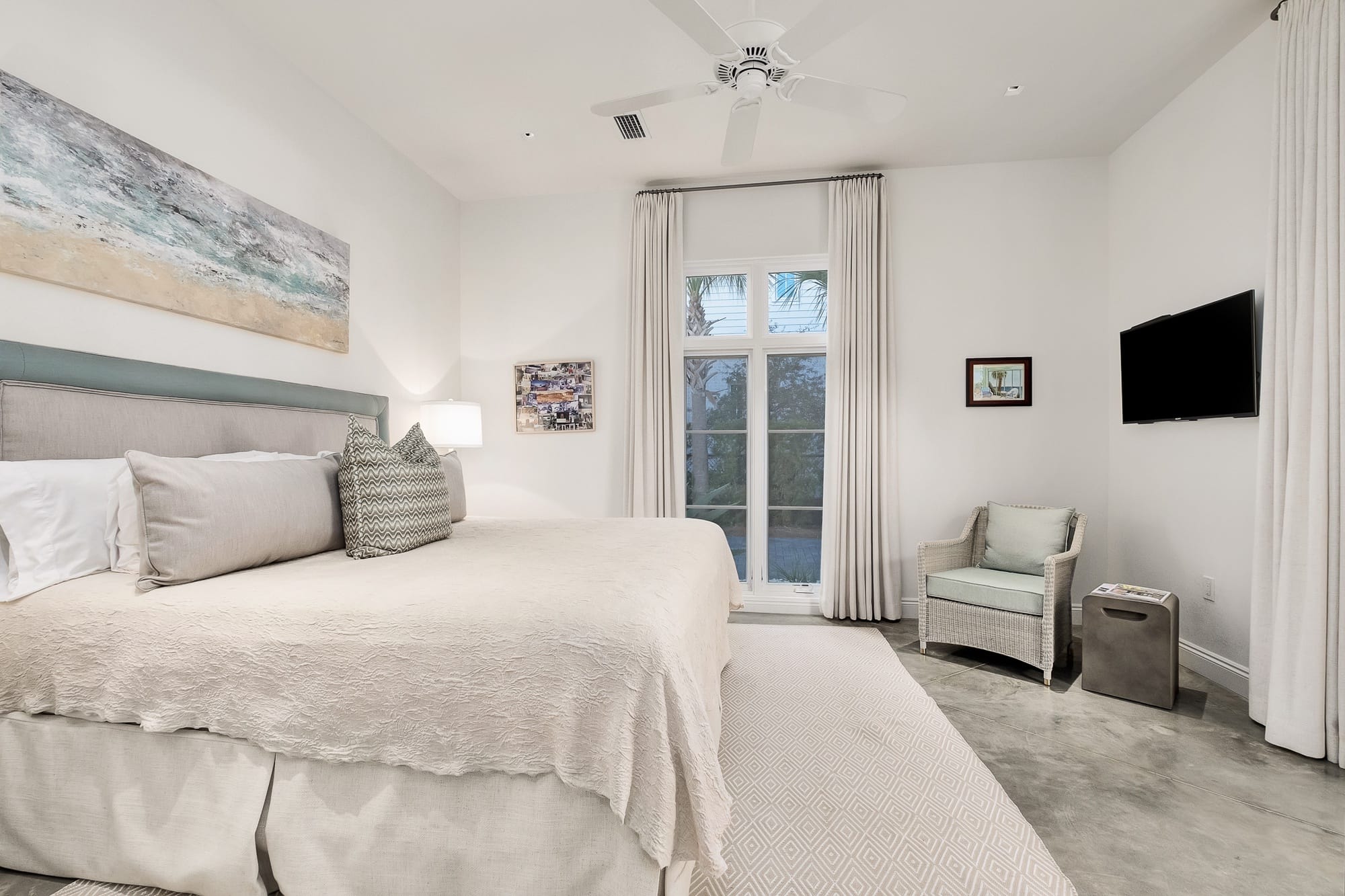 Minimalist bedroom with coastal decor.