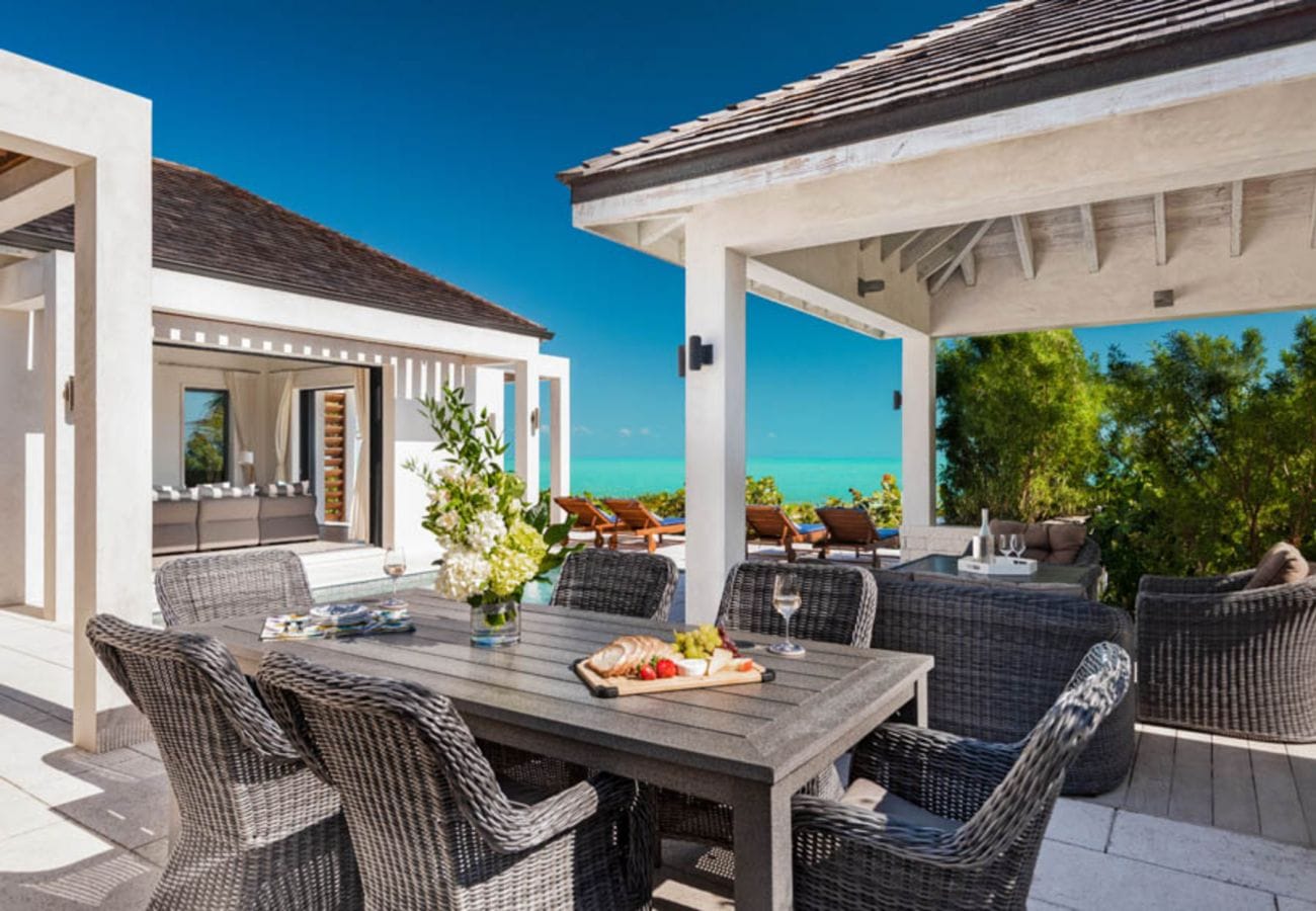 Outdoor patio with ocean view.