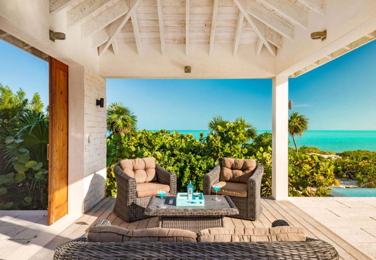 Cozy patio overlooking tropical ocean.