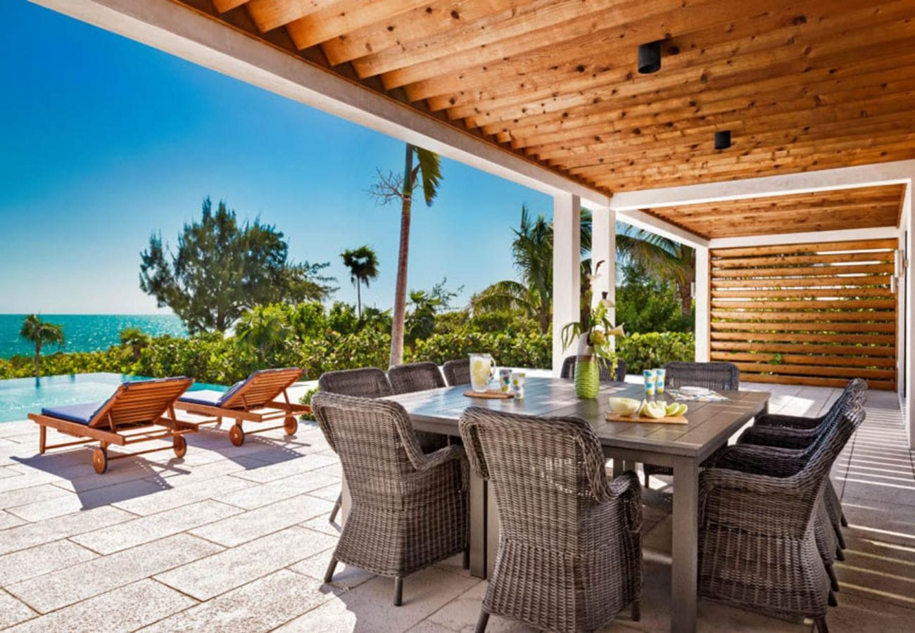 Outdoor patio with ocean view.