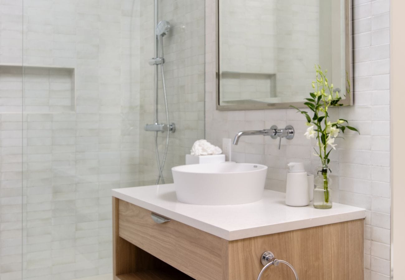 Minimalist bathroom with sleek fixtures.