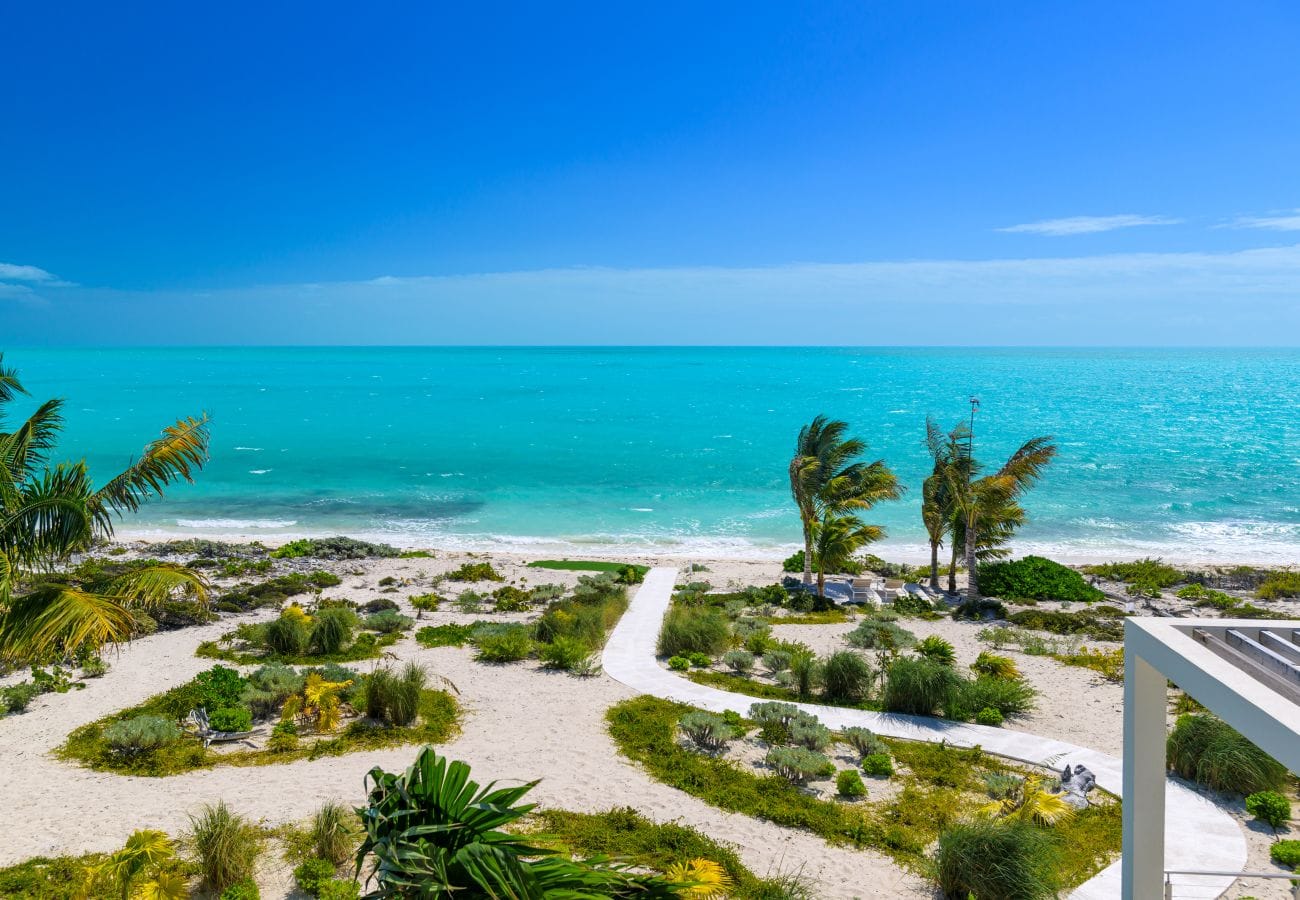 Sandy beach with turquoise sea.