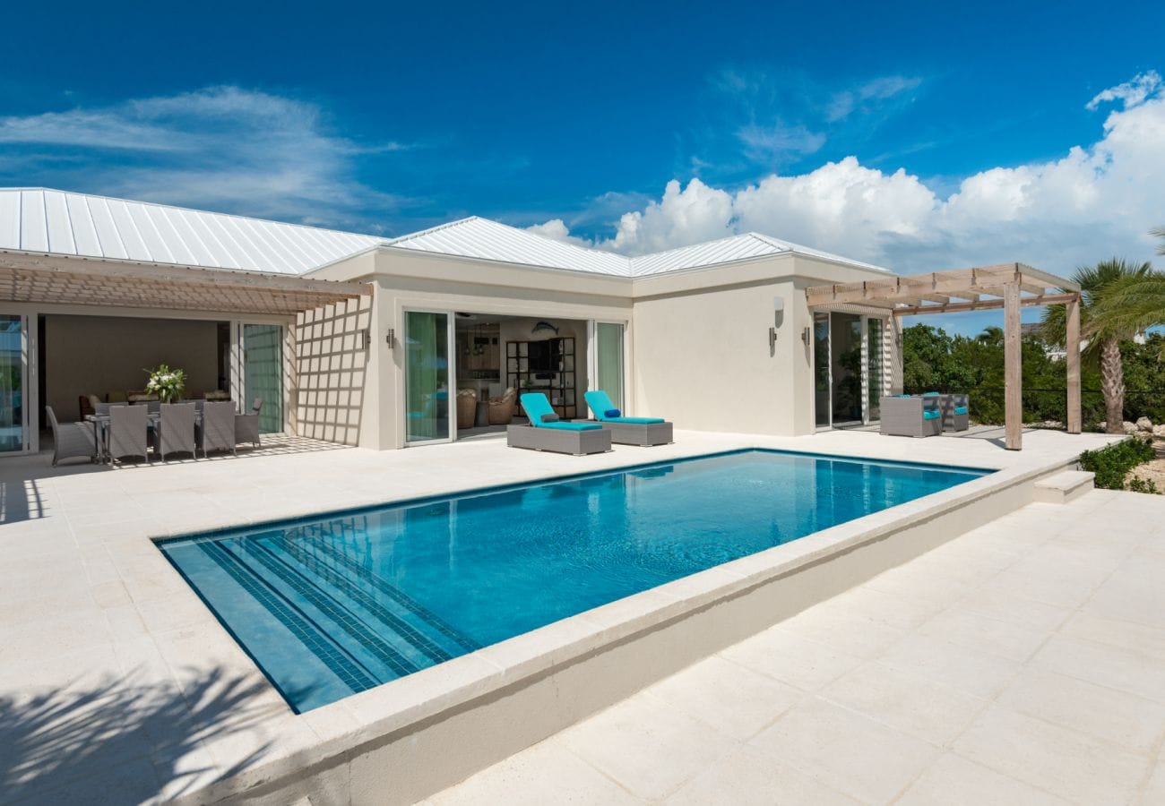 Modern house with pool and patio.