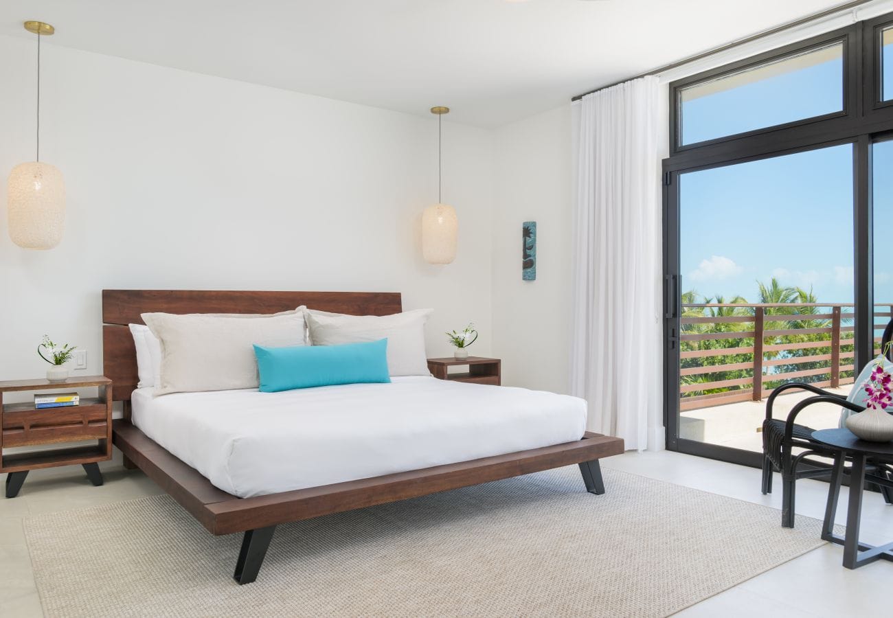 Modern bedroom with ocean view.