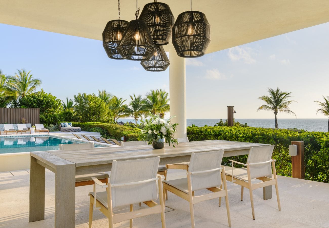 Outdoor dining area with ocean view.