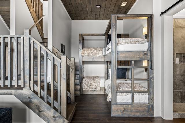 Rustic bunk beds in cozy room.