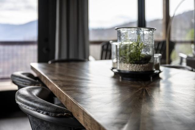 Wooden table with glass centerpiece.