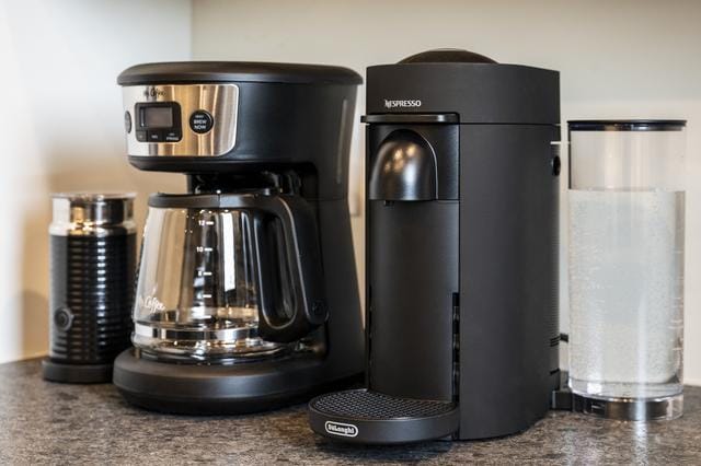 Coffee makers on kitchen counter.