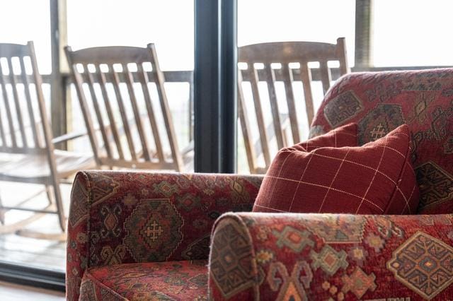 Patterned armchair and rocking chairs.