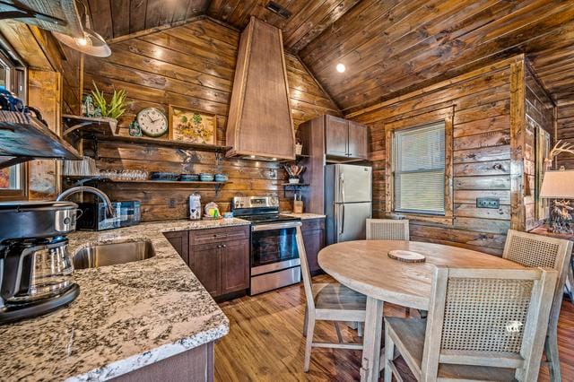 Rustic wooden kitchen and dining area.