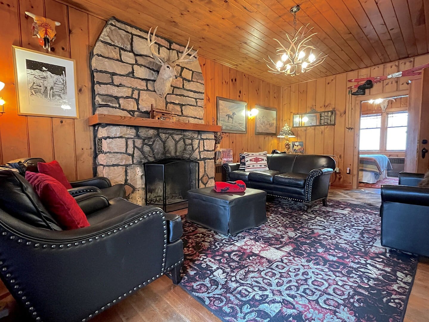 Cozy rustic living room, antler decor.