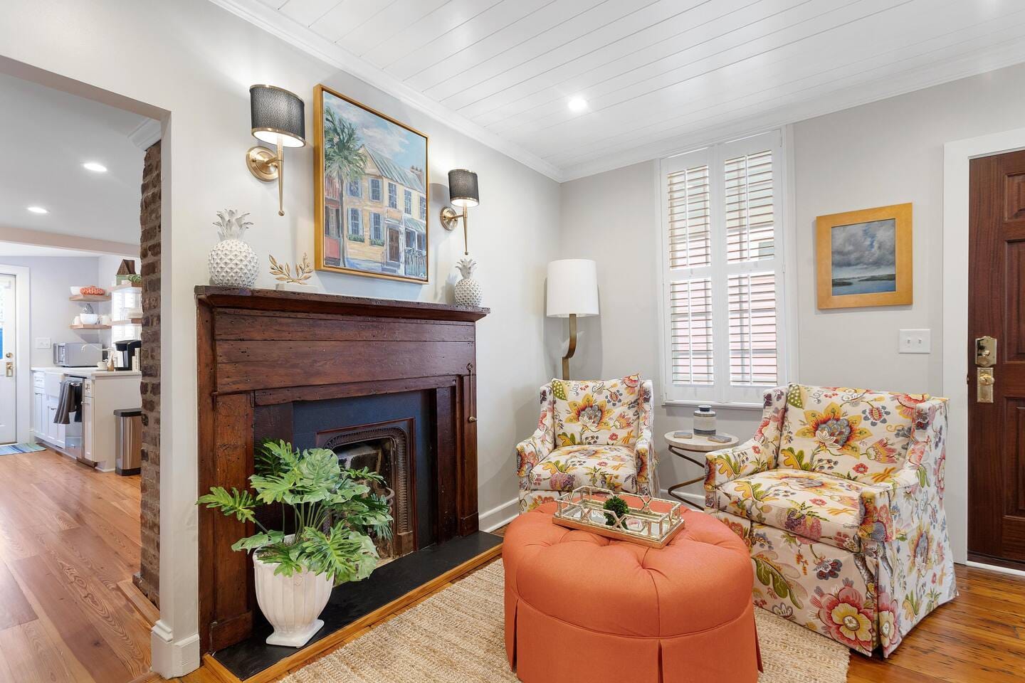 Cozy living room with floral chairs.