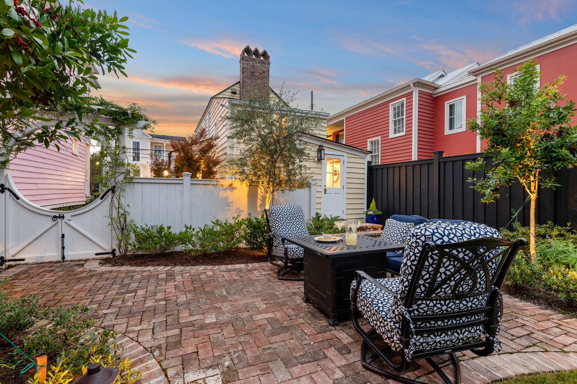 Cozy patio with patterned chairs.