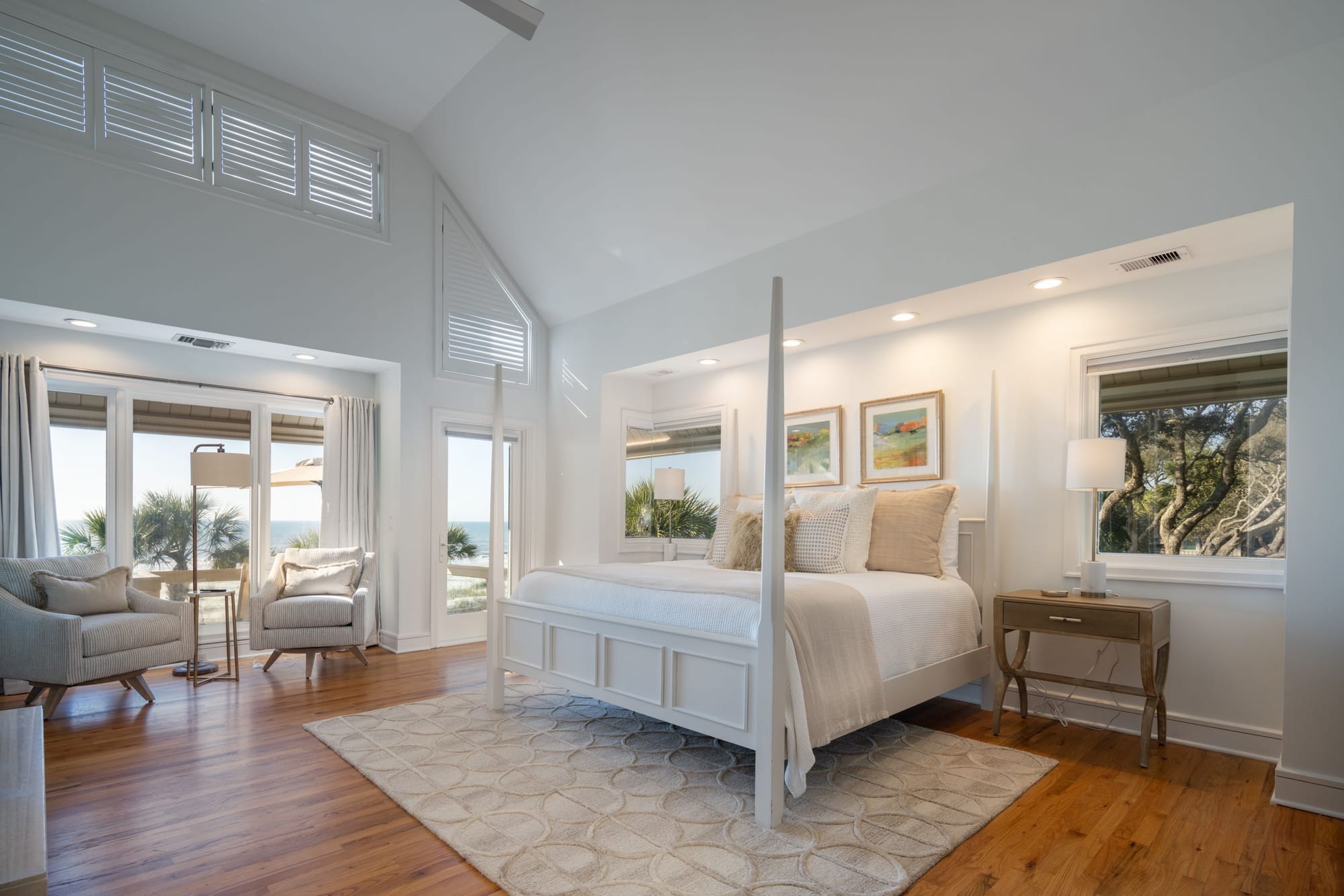 Bright, airy bedroom with ocean view.