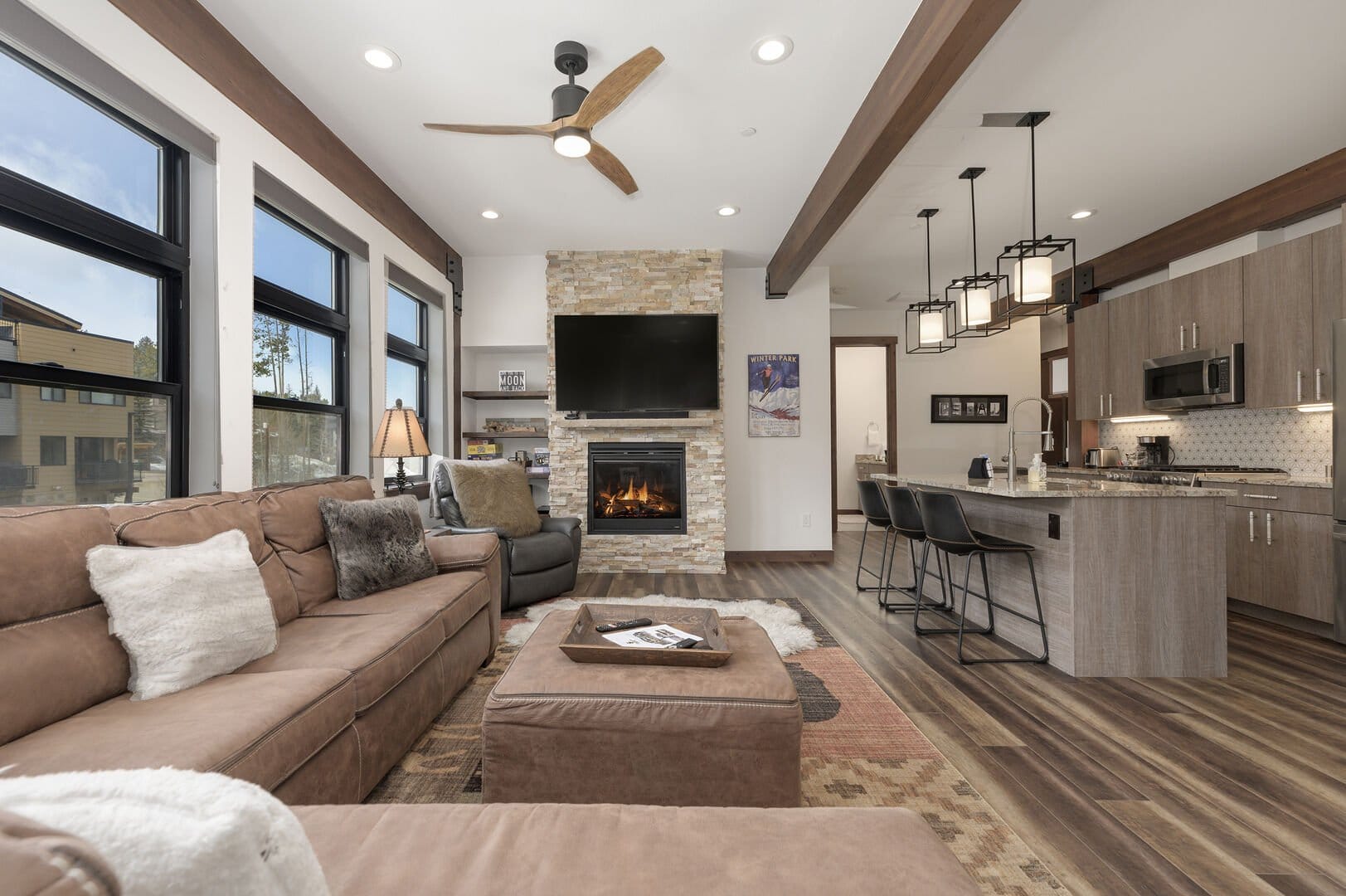 Modern living room and kitchen area.