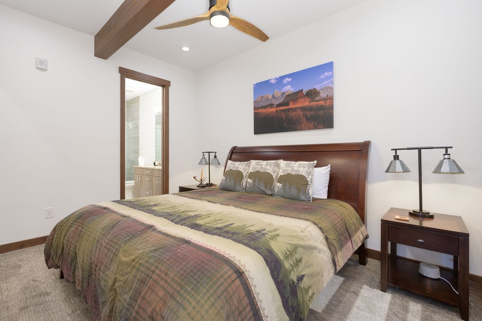 Modern bedroom with nature-themed decor.