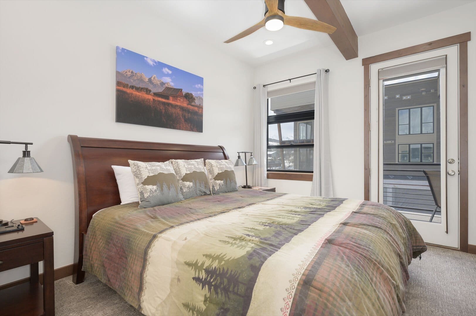 Cozy bedroom with landscape decor.