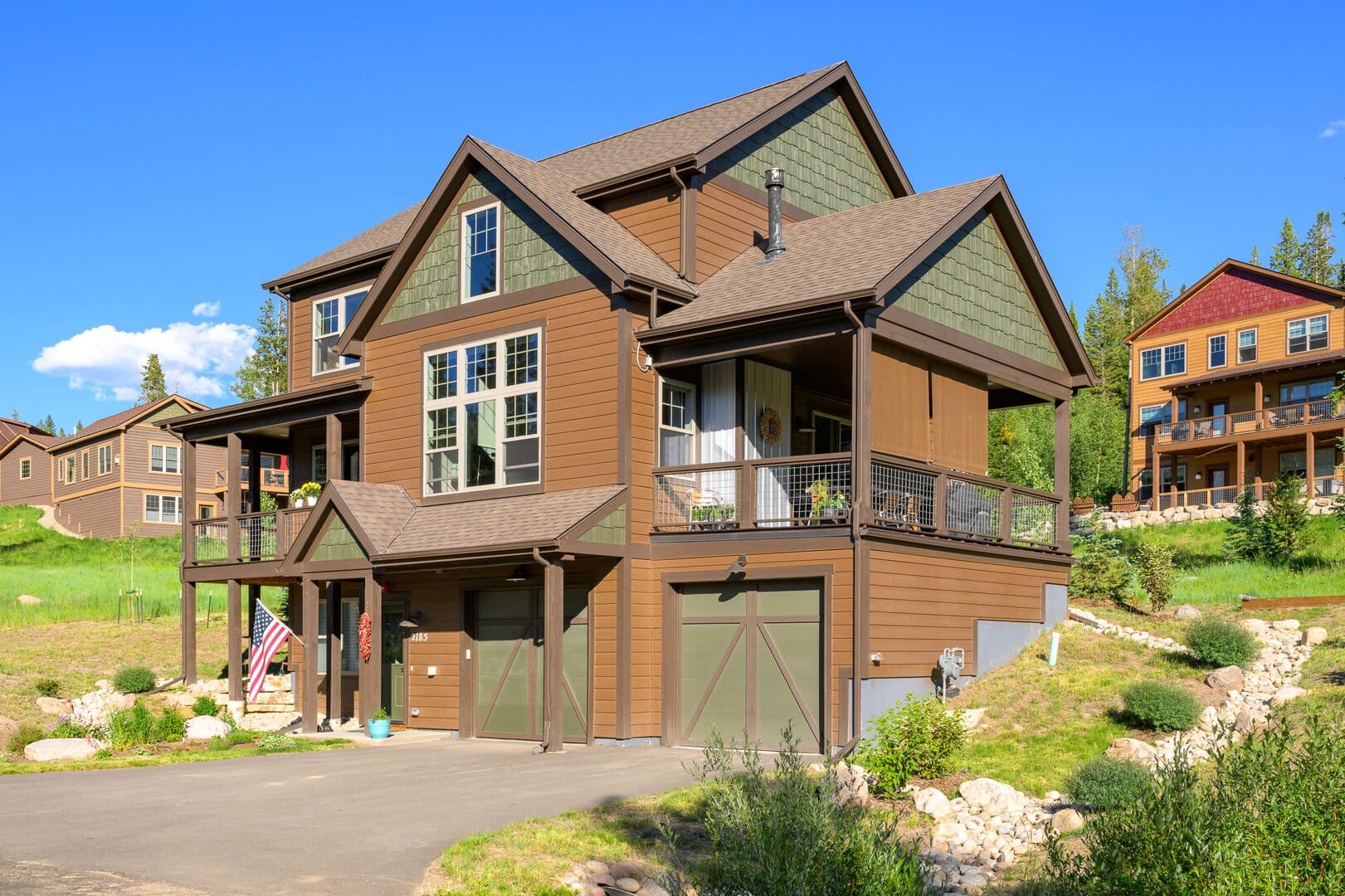 Two-story house with garage.