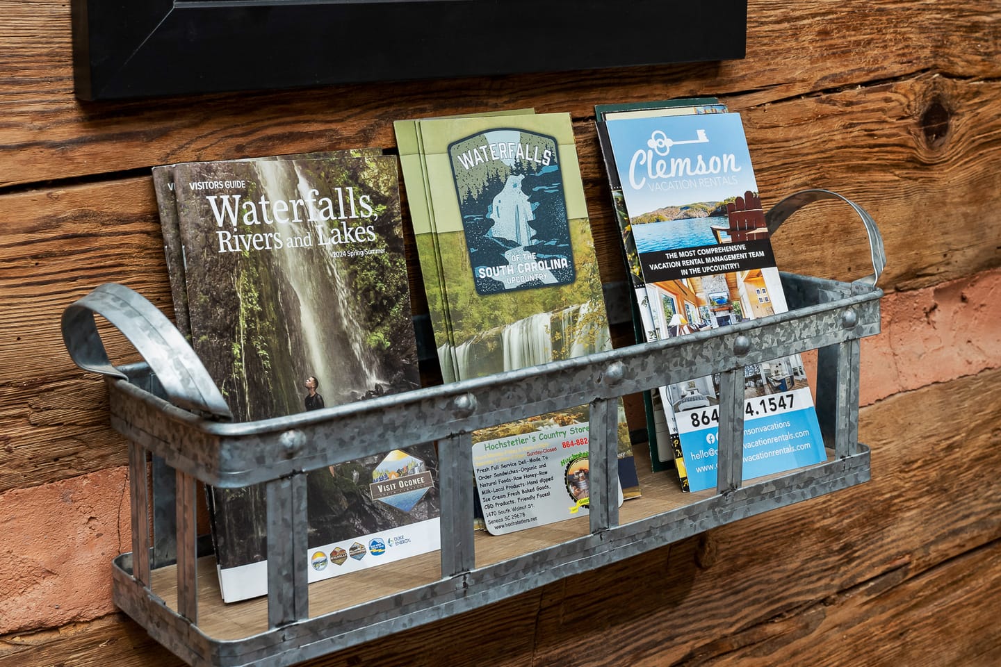 Brochures in a metal holder.