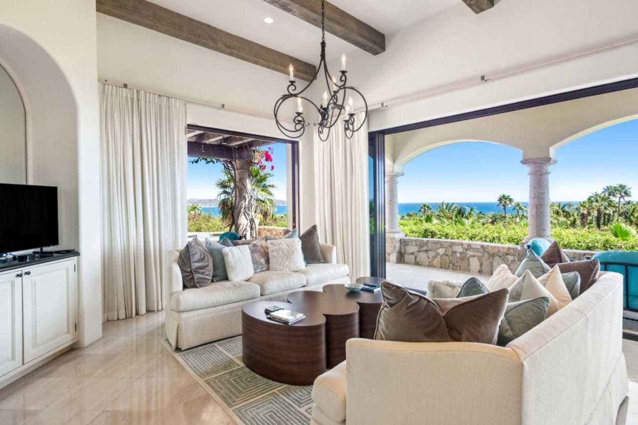 Luxurious living room with ocean view.