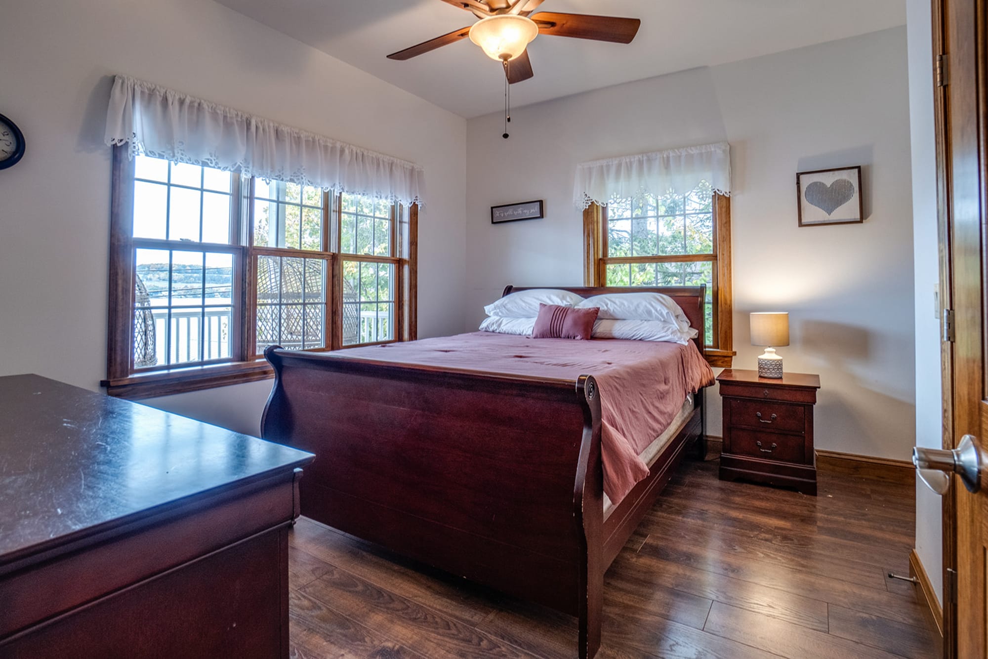 Cozy bedroom with wooden furniture.