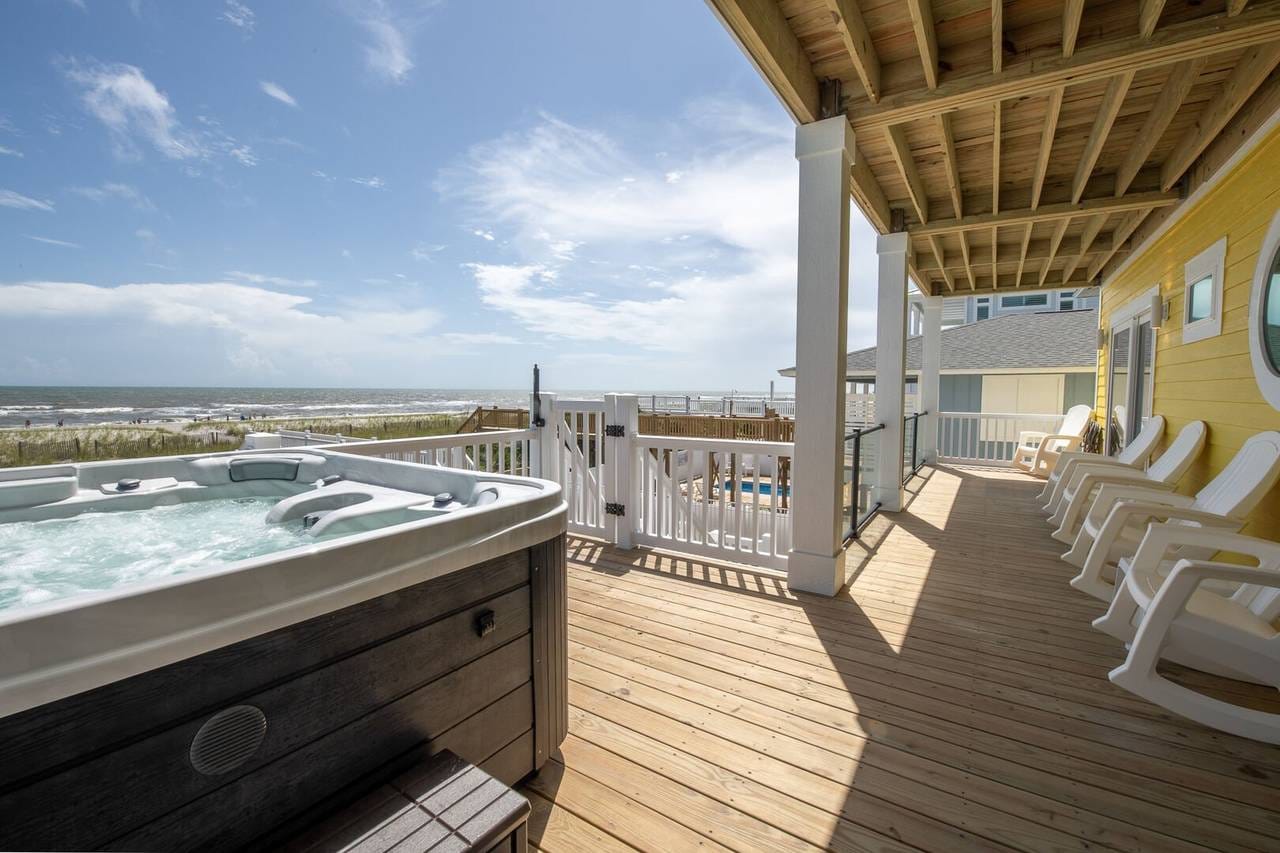 Beachfront deck with hot tub.