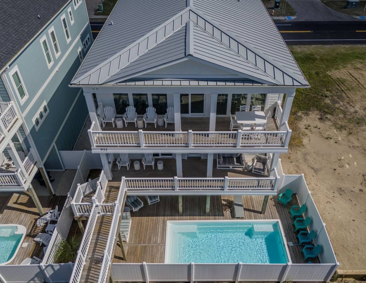 Beach house with pool and deck.