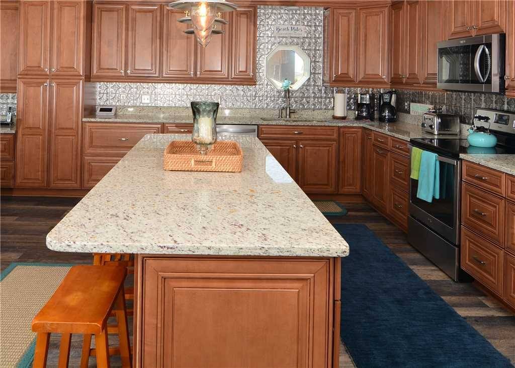 Modern kitchen with wooden cabinets.