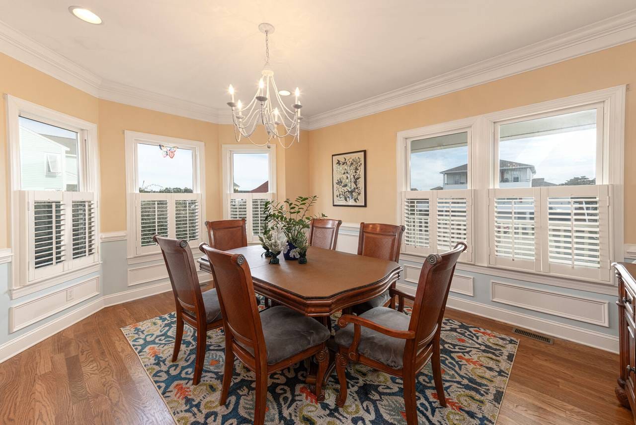 Elegant dining room with chandelier.