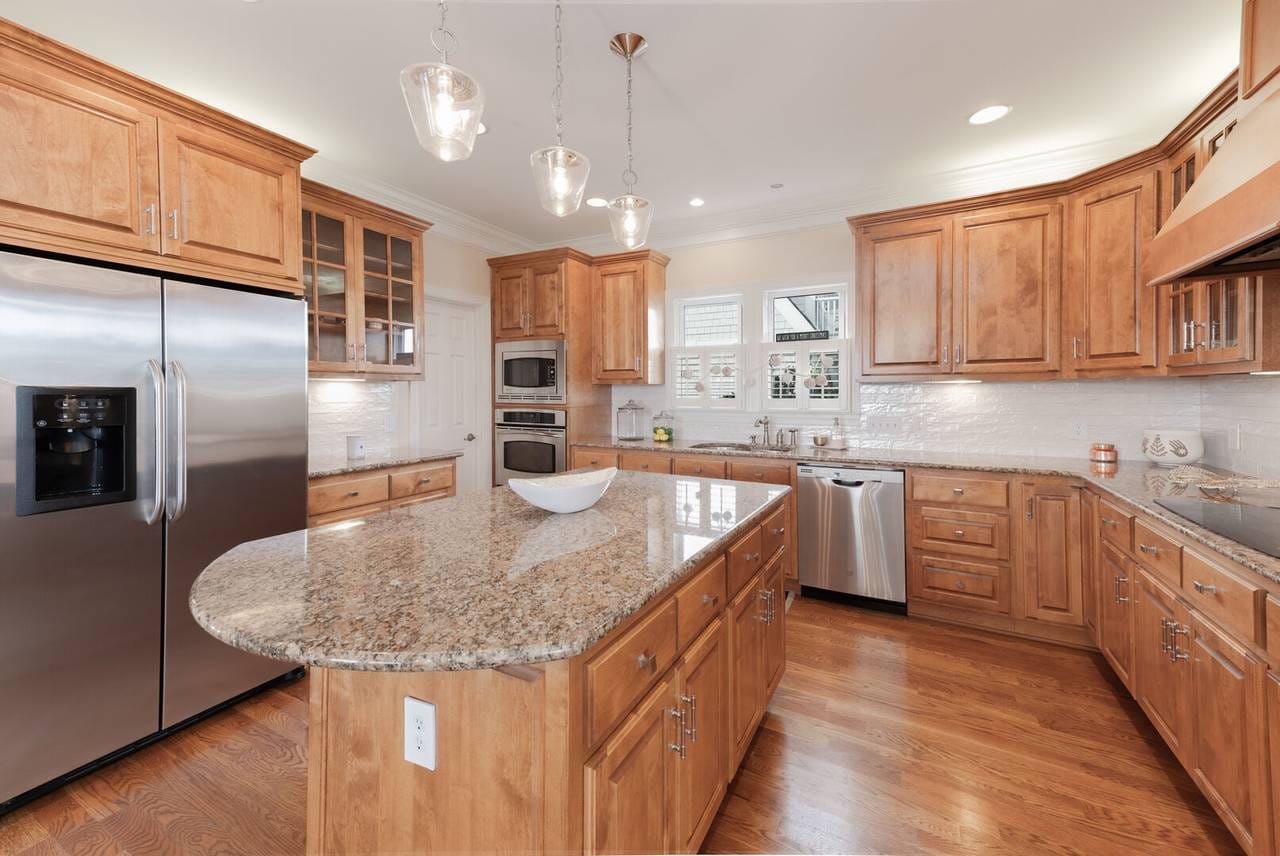 Modern kitchen with wooden cabinets.