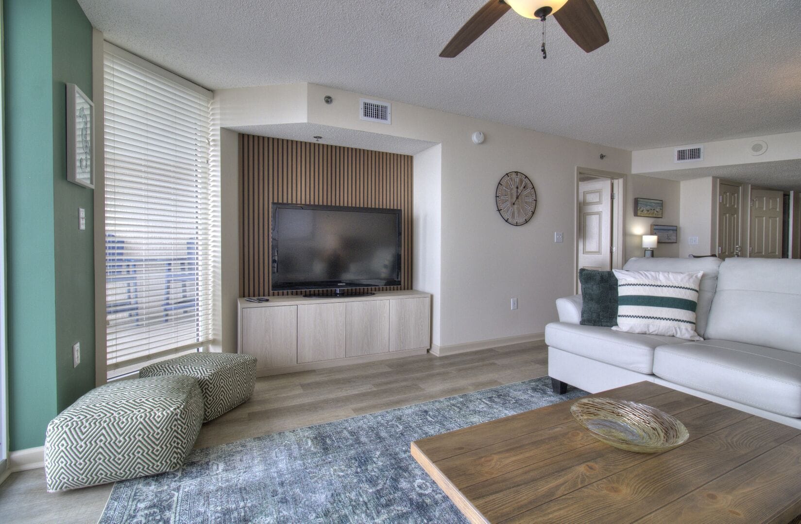 Modern living room with TV setup.