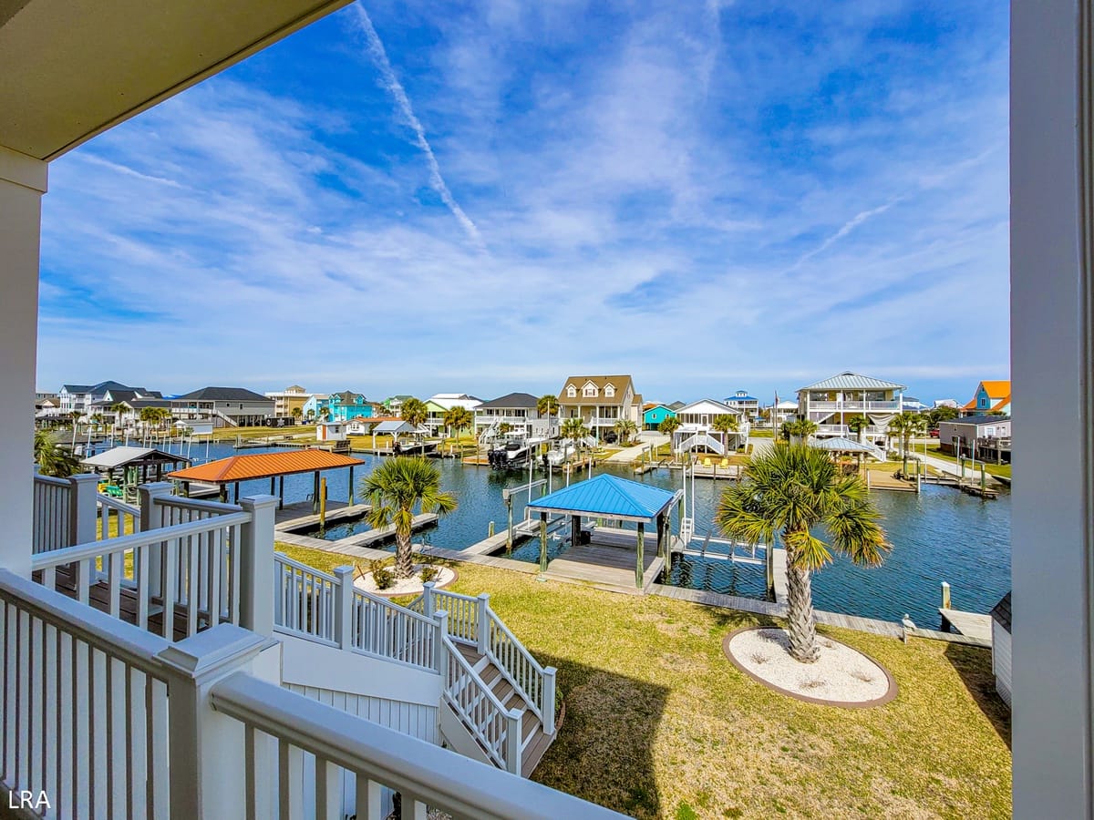 Canal view with colorful houses.