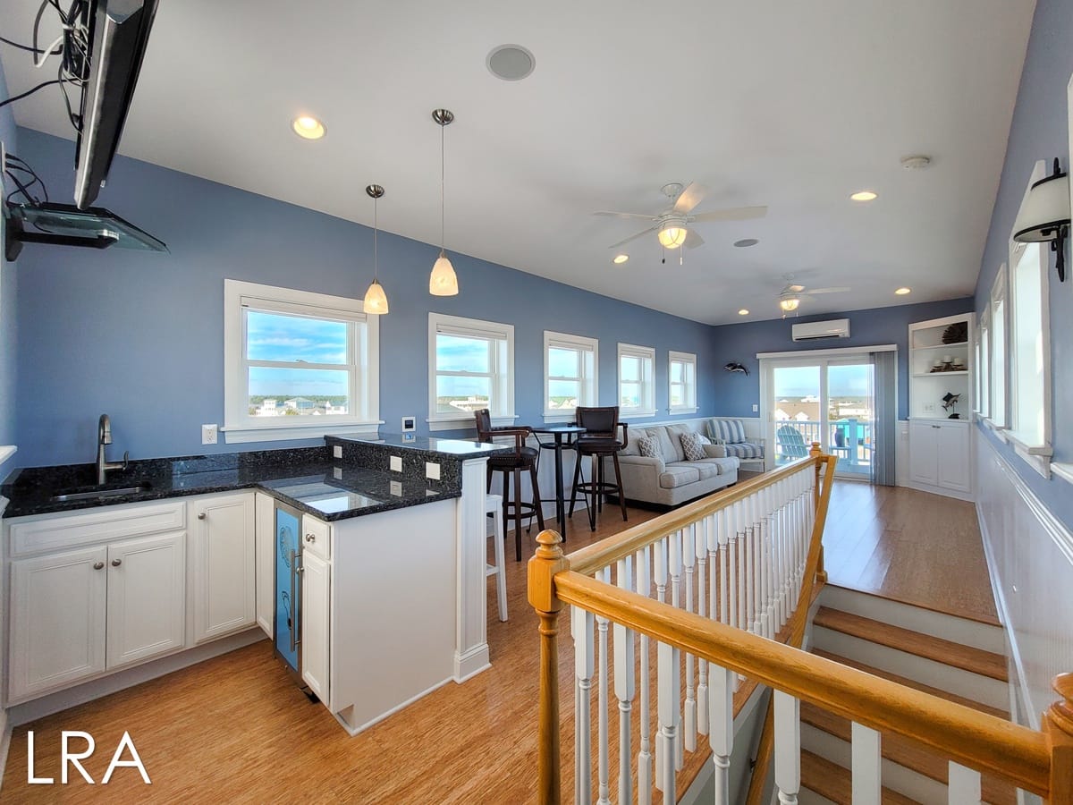 Open-concept kitchen and living room.