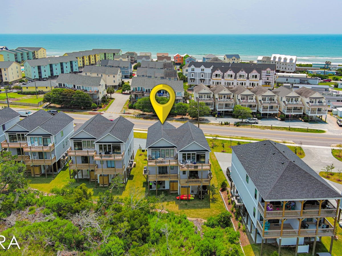 Aerial view of coastal houses.