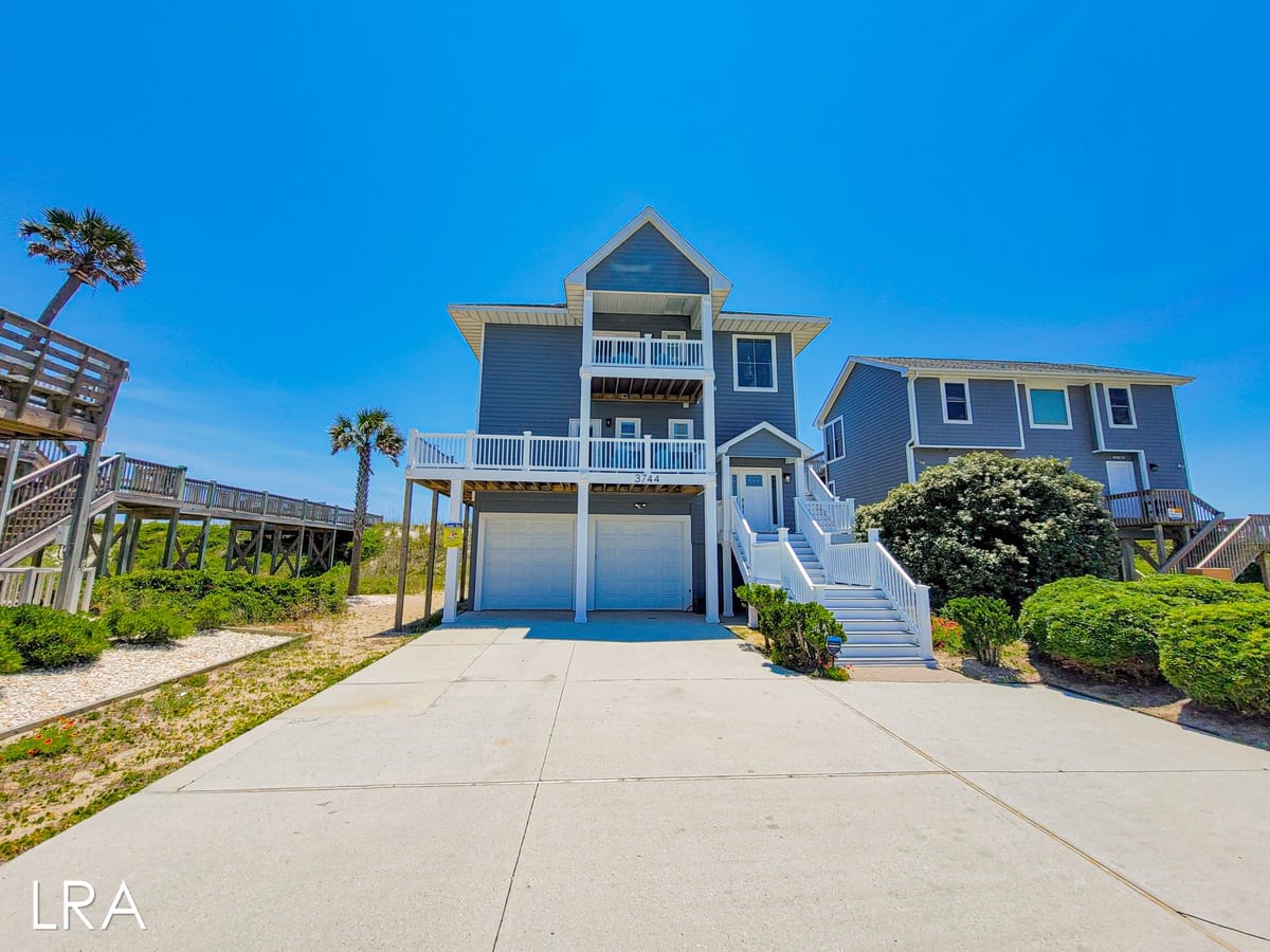 Beach house with blue sky background.