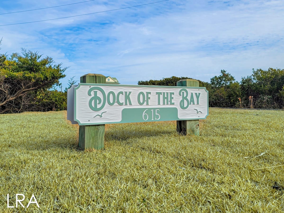 Sign reading "Dock of the Bay".