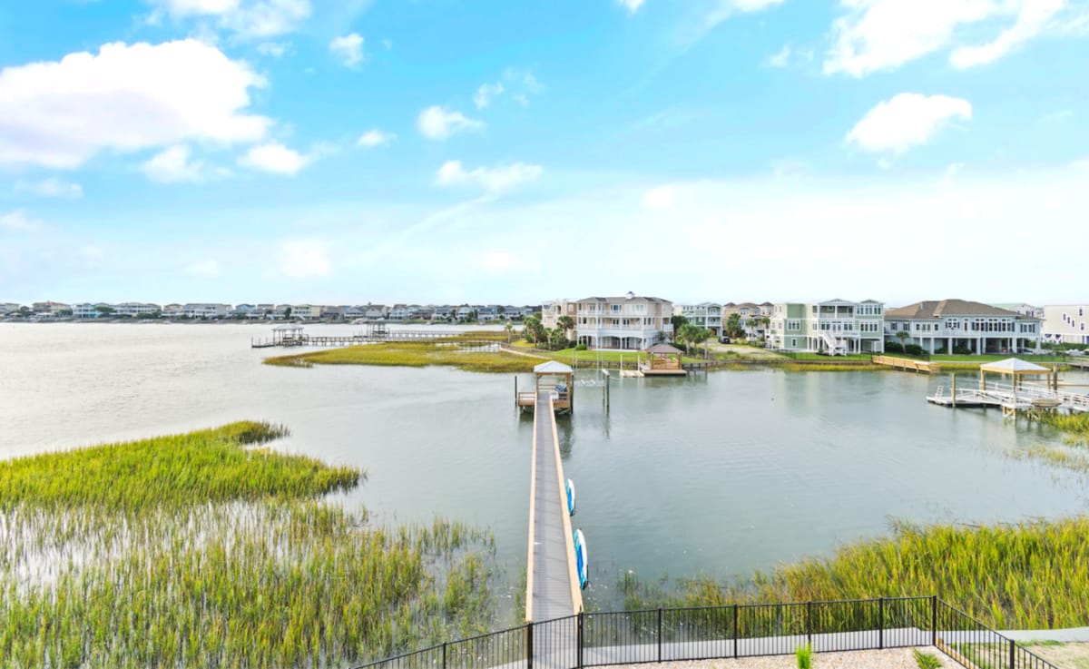 Lakefront homes with boat dock.