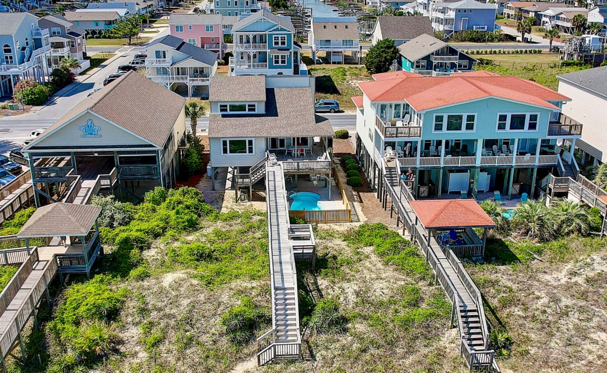 Aerial view of beachfront houses.