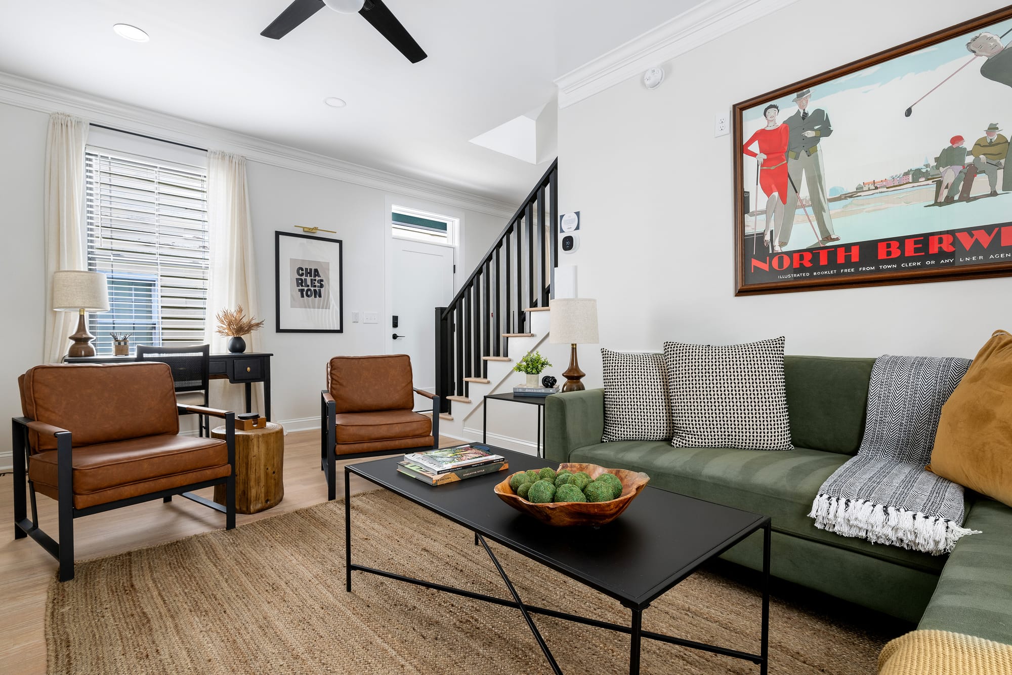 Modern living room with brown chairs.